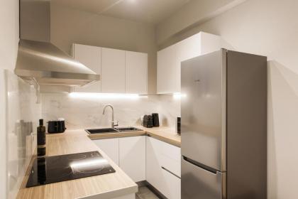 Absolute 2BR Apartment near EMST Museum by UPSTREET - image 18