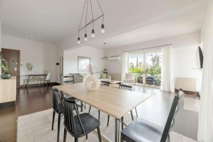 Panoramic 1BR Apartment near Kallimarmaro Stadium by UPSTREET - image 3