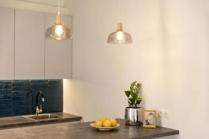 Versi2- Stylish 1BR pays homage to timeless charm - image 15